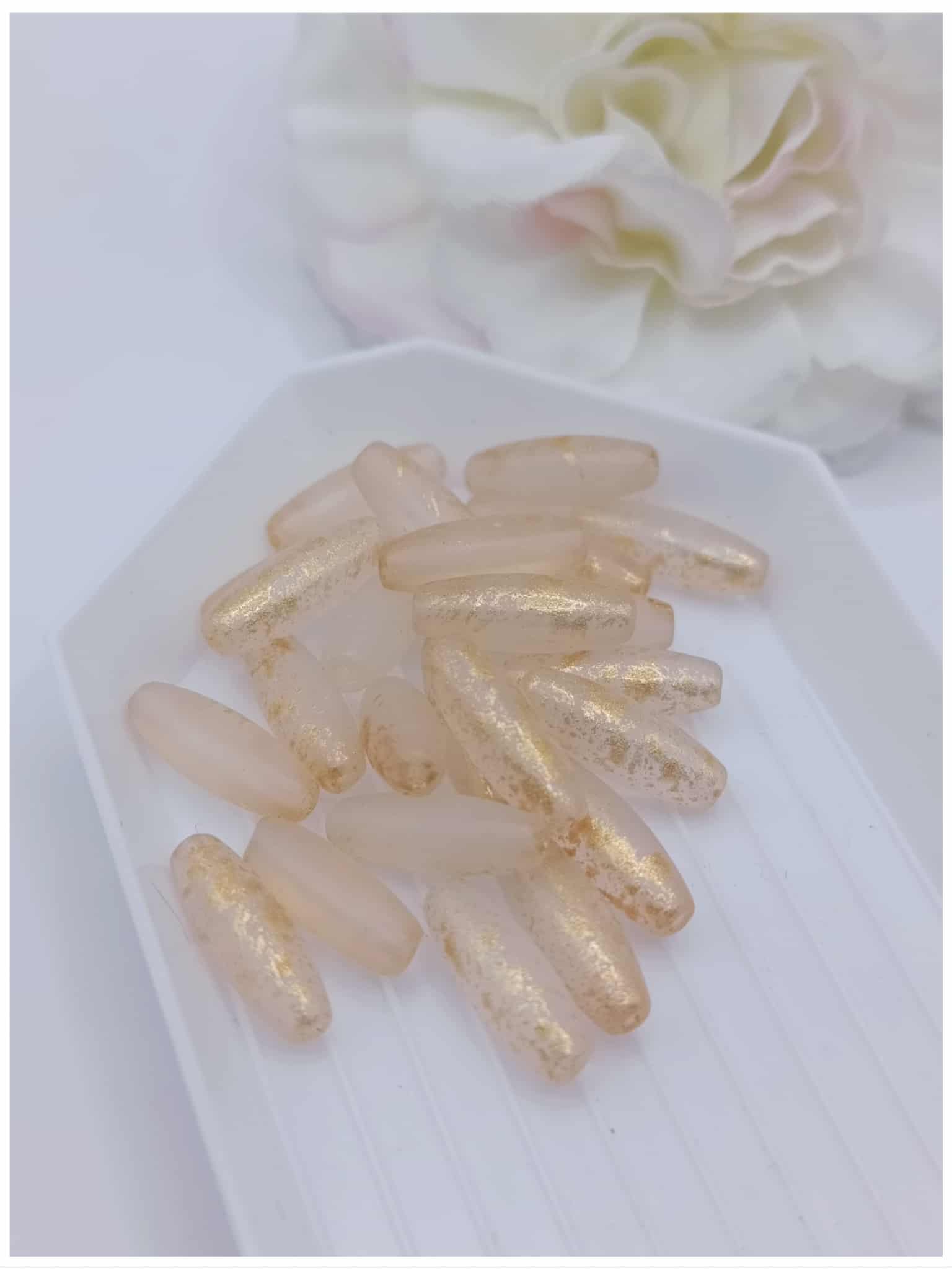 Perle de verre grain de riz - 12 x 4 mm - Orange doré perle de verre grain de riz 12 x 4 mm orange doré