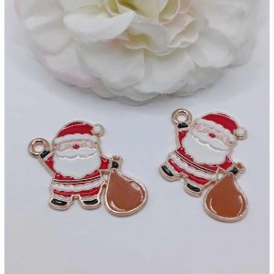 Breloque dorée émaillée Père Noël sac