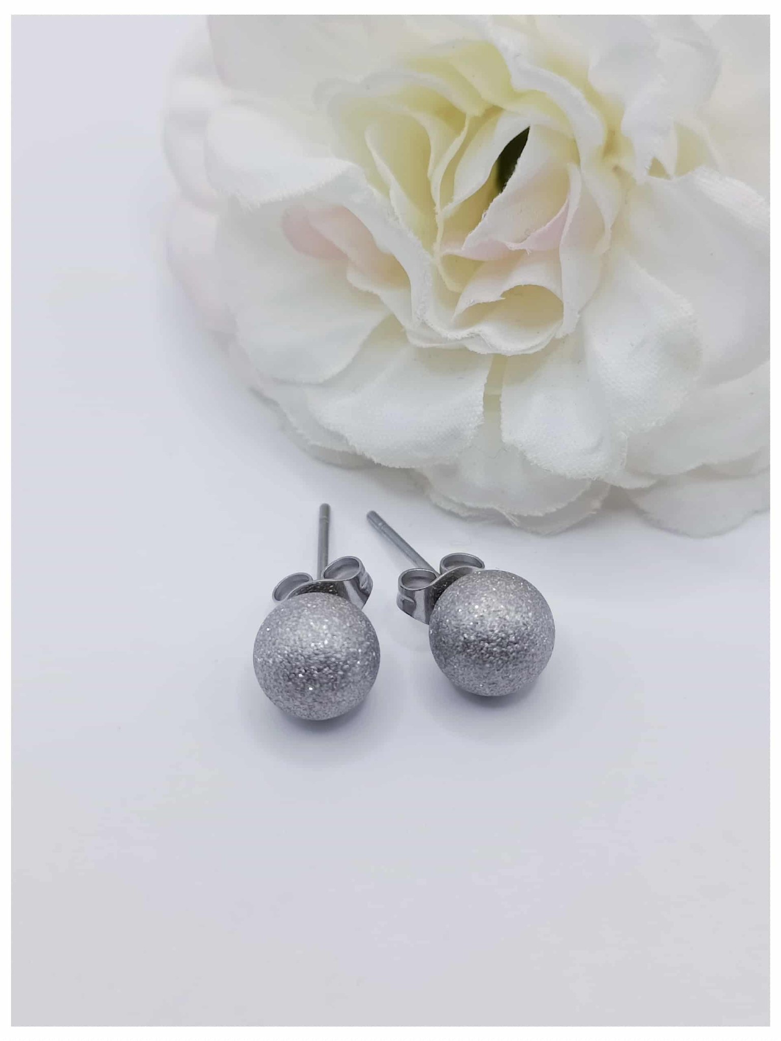 paire de puce acier inoxydable ronde stellaire 8 mm