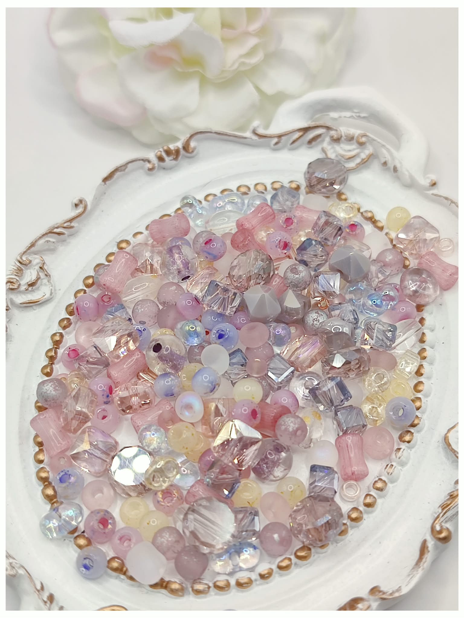 perles de rocailles en verre rose doux